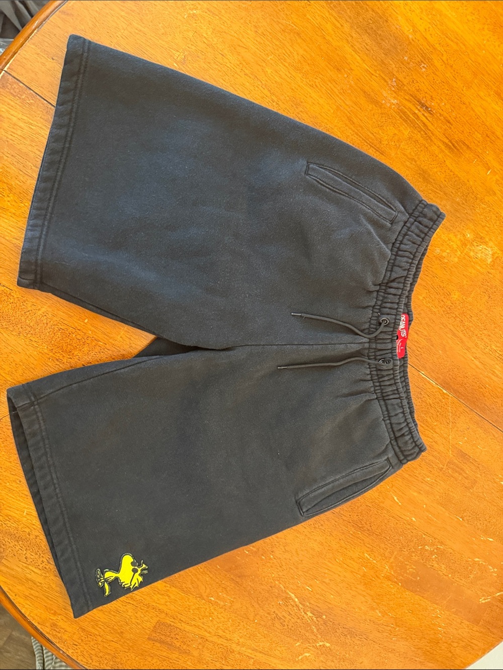 Peanuts Black men Graphic Fleece Shorts with Yellow Woodstock Detail L